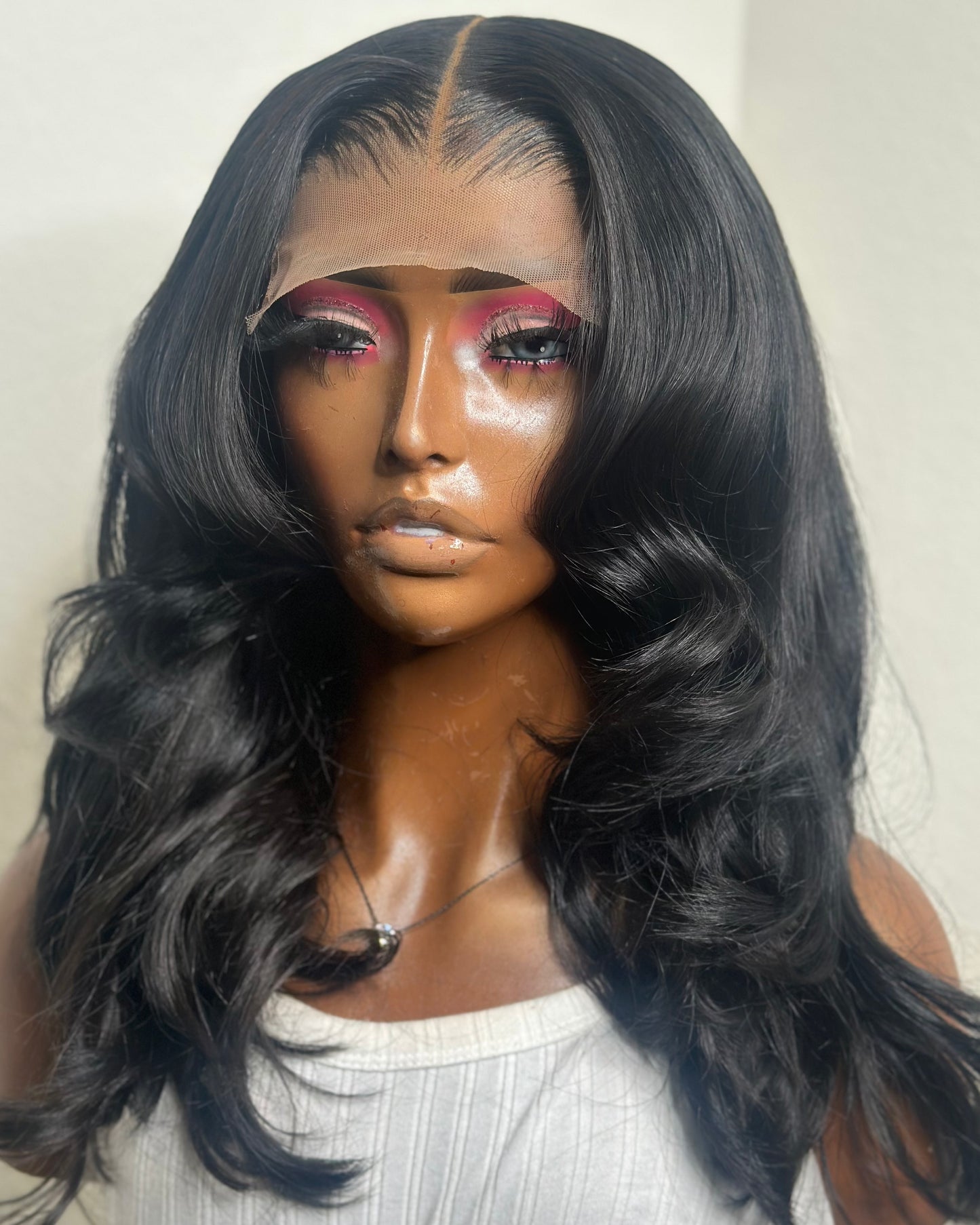Barbie 5x5 closure wig in natural black body wave – front view by Love Trina & Co.