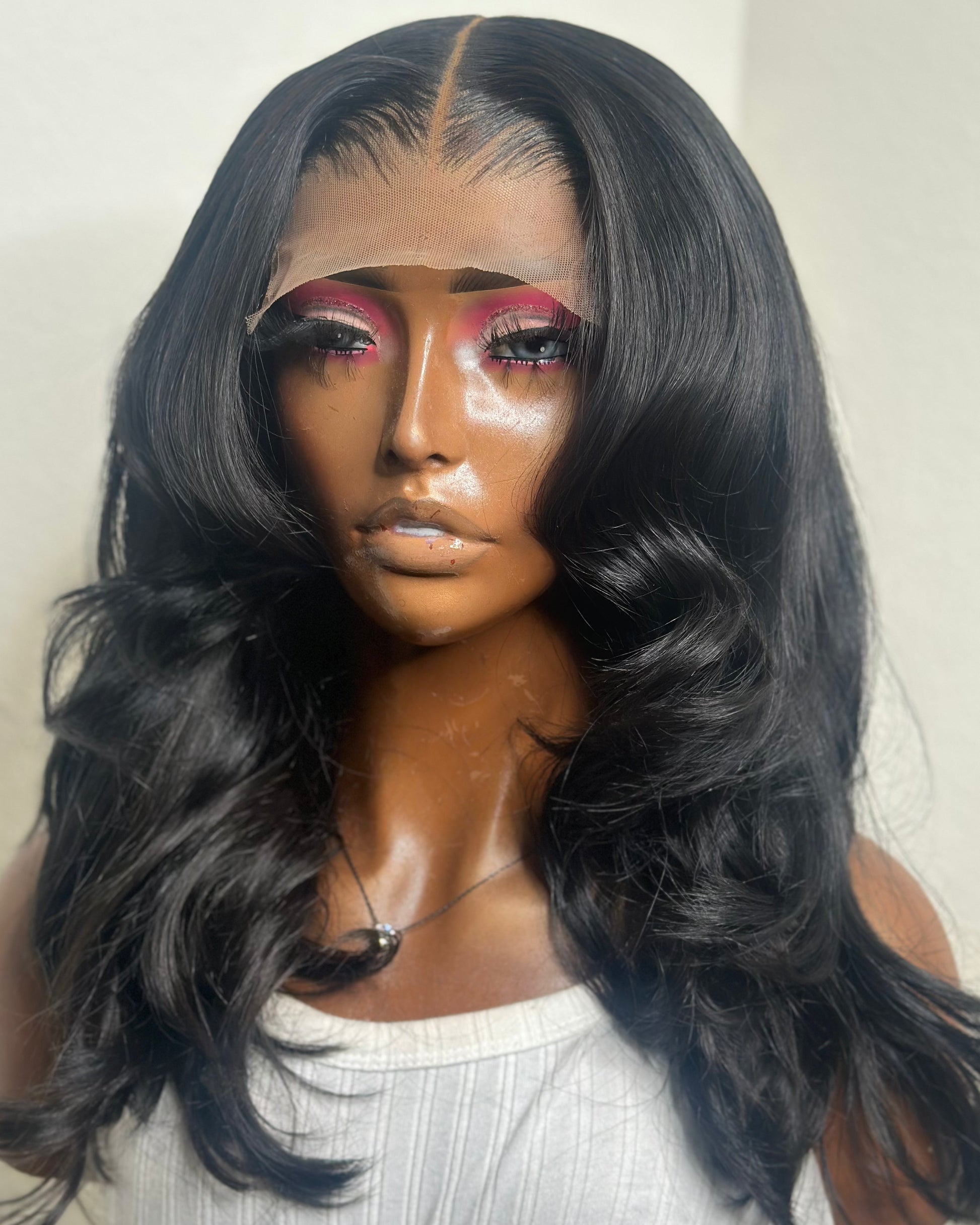 Barbie 5x5 closure wig in natural black body wave – front view by Love Trina & Co.